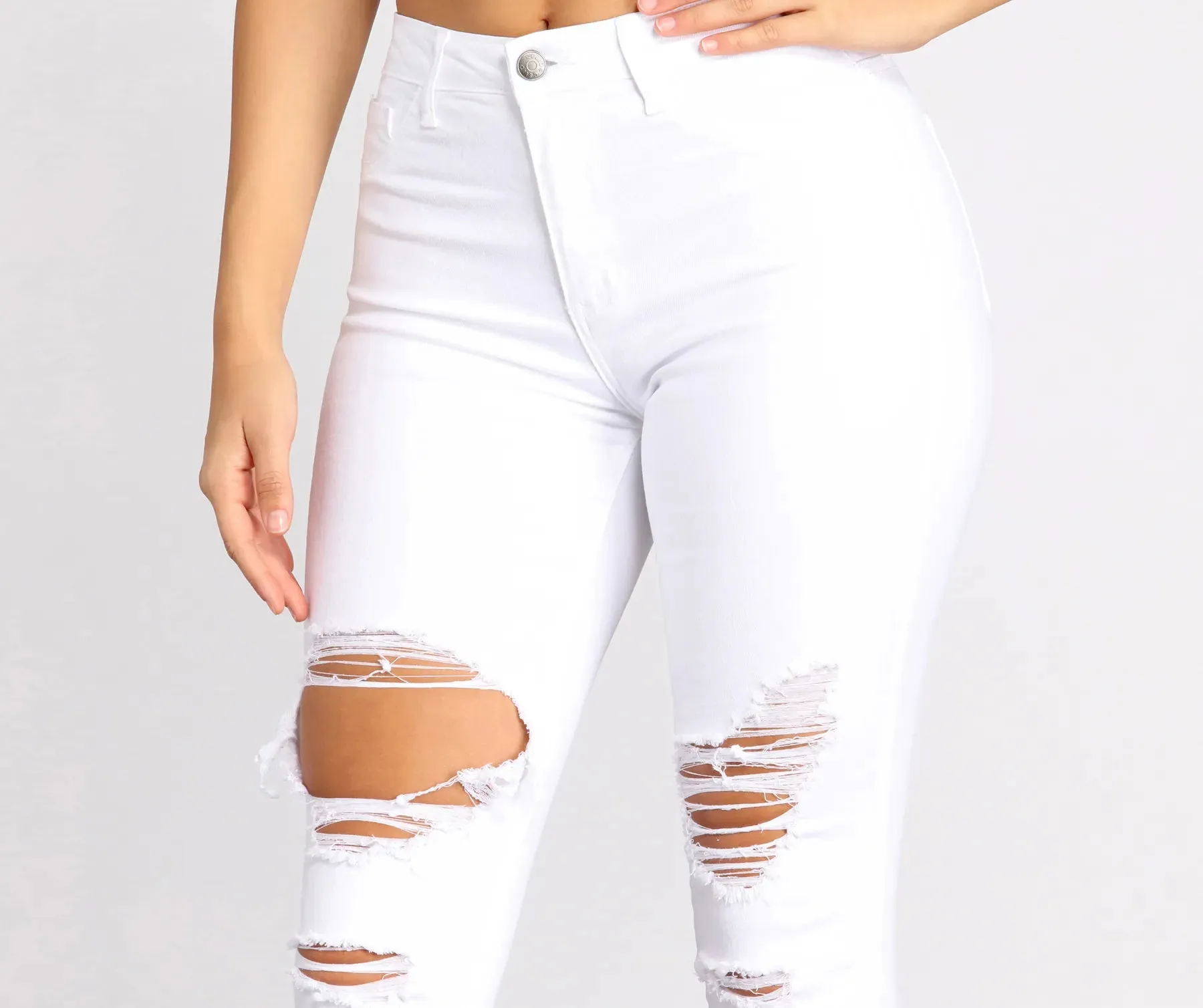 High Rise Destructed Denim Skinny Jeans