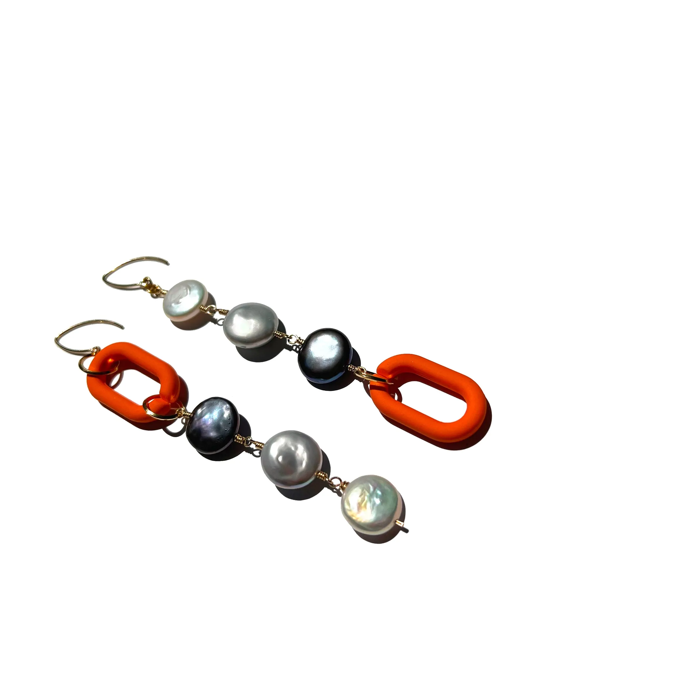 MPR x IMAGINARIUM: Grey-Tone Pearl Shoulder Dusters with Pop of Orange