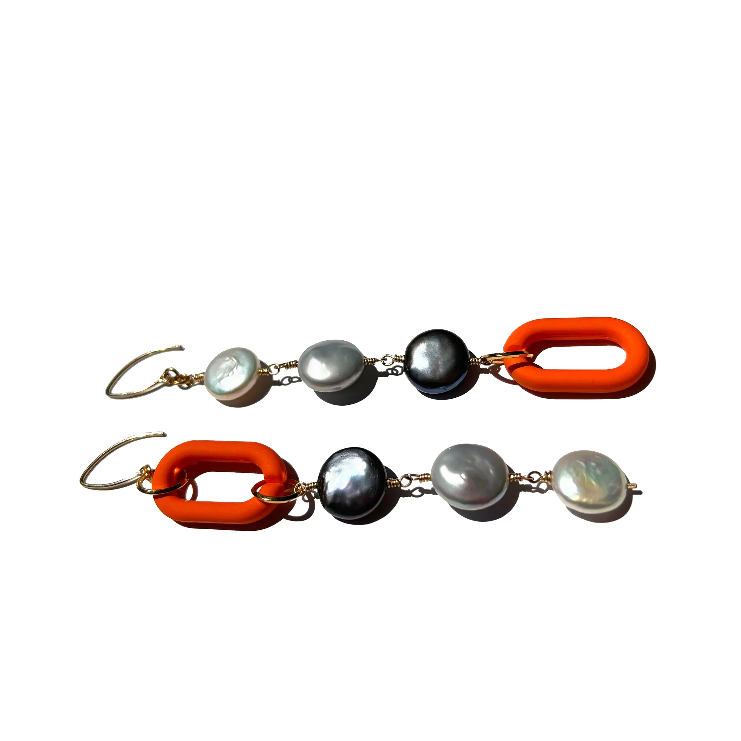 MPR x IMAGINARIUM: Grey-Tone Pearl Shoulder Dusters with Pop of Orange
